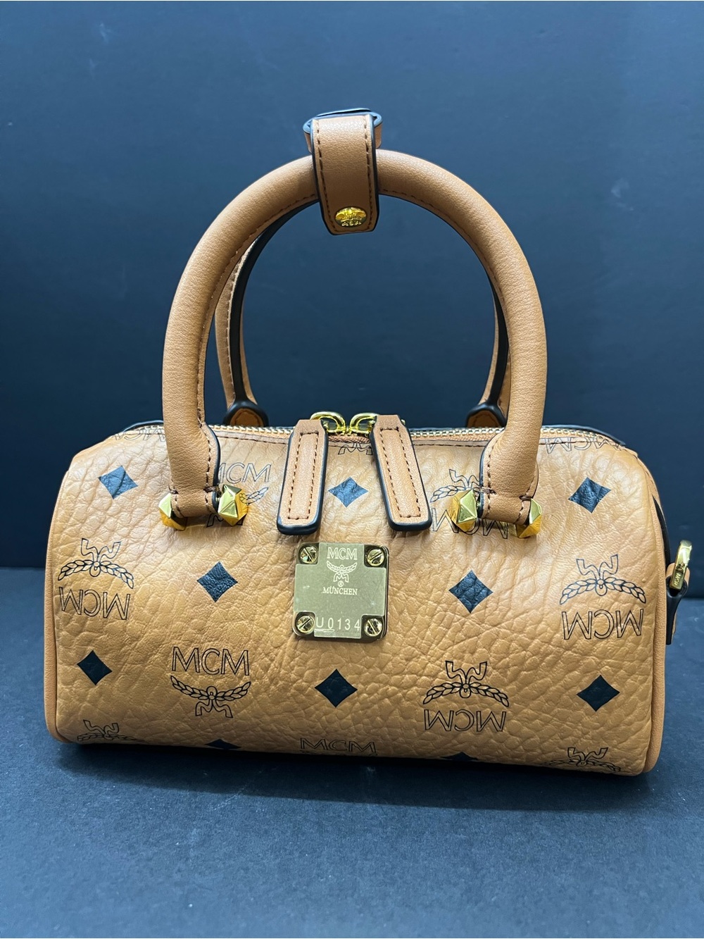 MCM Cognac Visetos Logo Dome Satchel with Gold Hardware 
Mini Boston 18cm